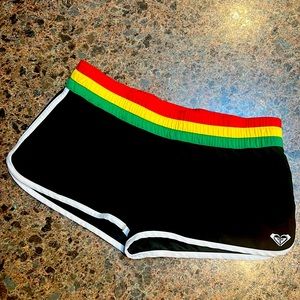 Super cute Roxy rasta board shorts.  Size 9.